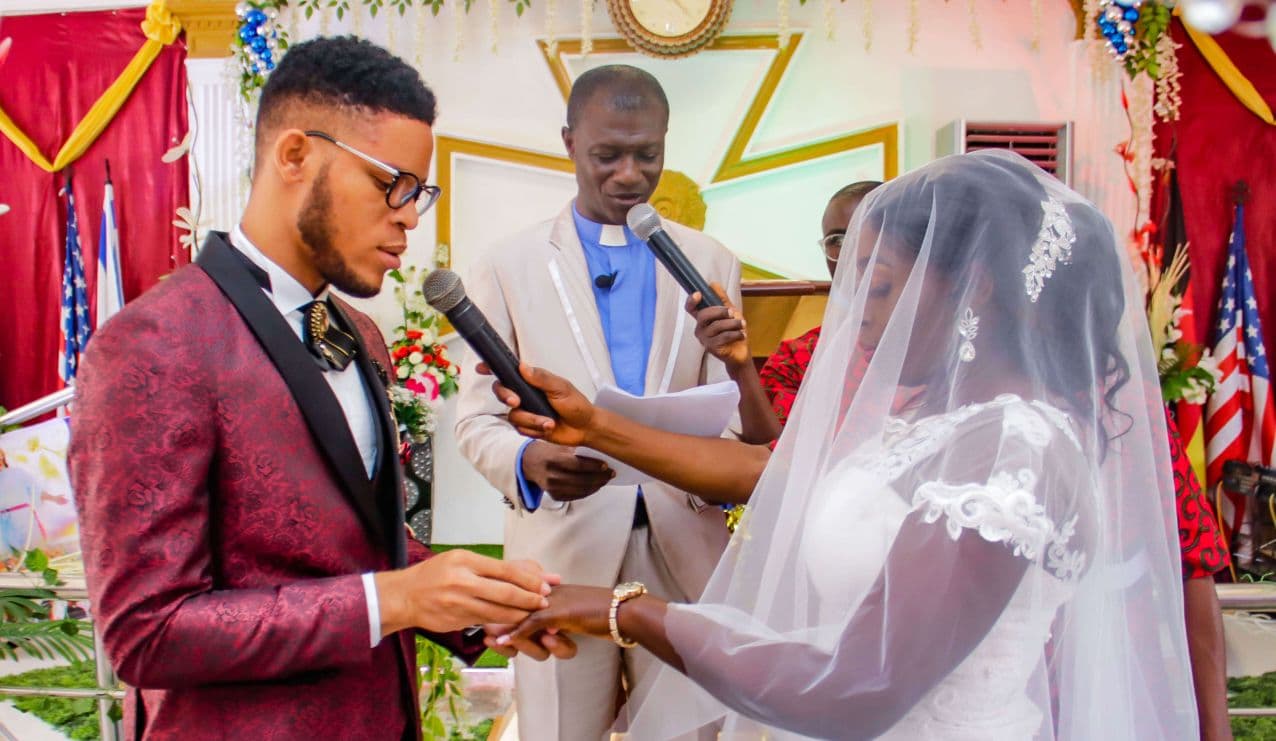 The couple exchanging vows