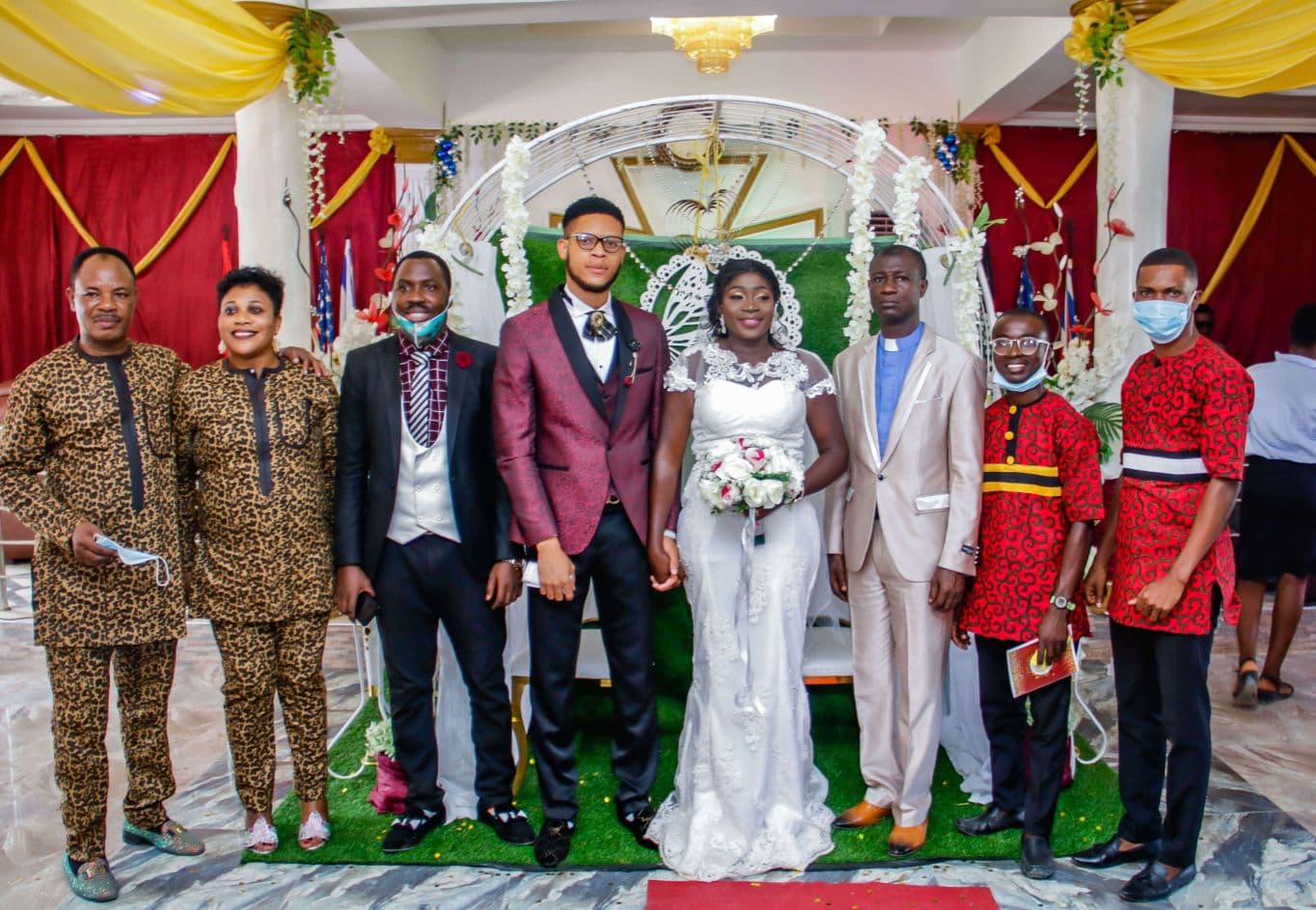 Posing with pastors and deacons in attendance